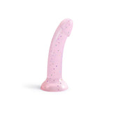 Introducing the DilDolls Starlight Silicone Suction Cup Dildo by Dildolls: a pink, phallic-shaped silicone pleasure tool featuring a curved design and a robust suction cup for stability. It is adorned with an array of small, colorful star-shaped glitter throughout its surface, enhancing its waterproof nature for adventurous fun.